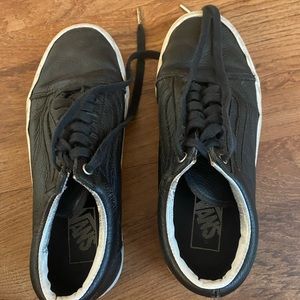 Black low top leather vans